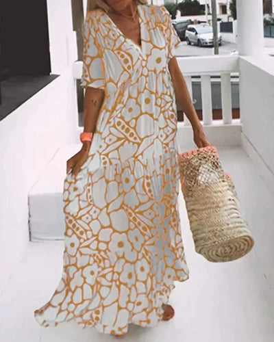 Weites Kleid mit V-Ausschnitt und Print