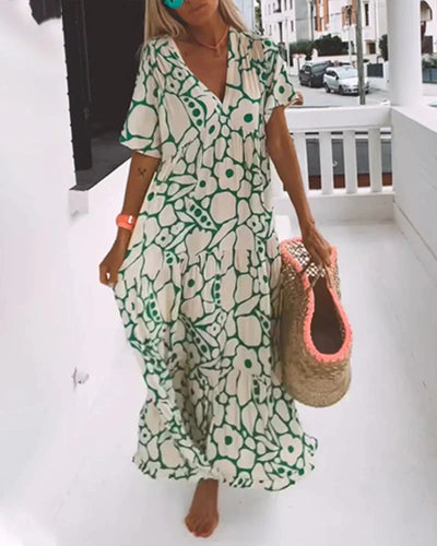Weites Kleid mit V-Ausschnitt und Print