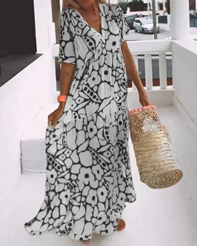 Weites Kleid mit V-Ausschnitt und Print